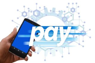 Person paying bill online with credit card